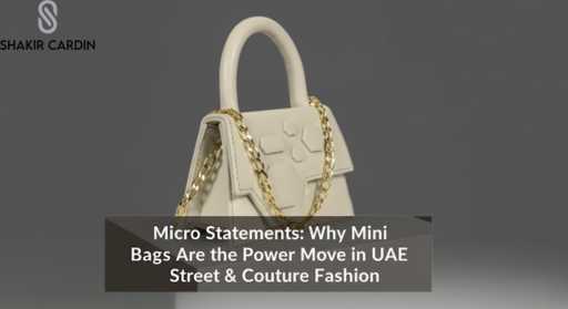 A cream-colored mini handbag with a top handle and a gold chain strap rests on a white pedestal against a dark grey background. Overlay text reads: "Micro Statements: Why Mini Bags Are the Power Move in UAE Street & Couture Fashion."